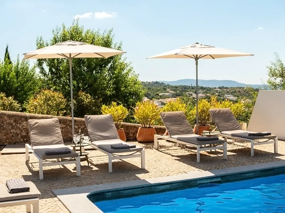 Create a shaded lounge area poolside to cool off